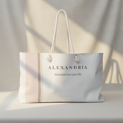 Tote bag with 'ALEXANDRIA' branding on a light background