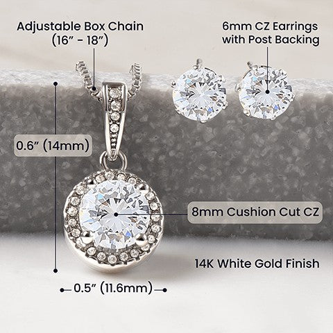 Jewelry set with pendant, chain, and earrings with dimensions on a gray background