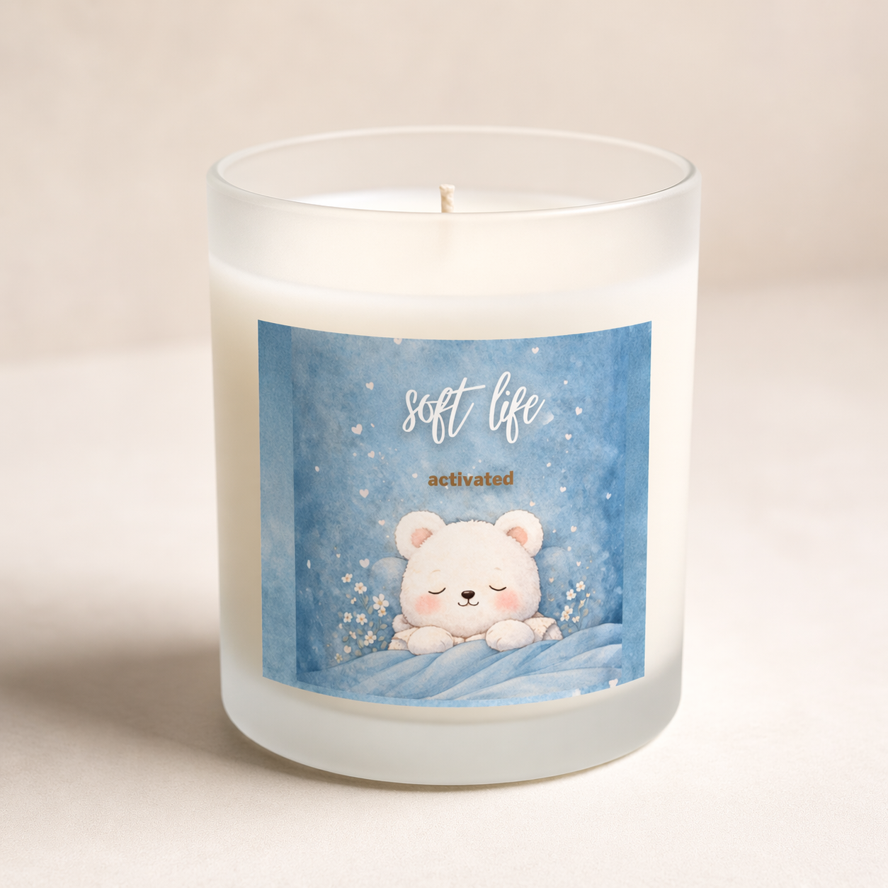 Soft Life soy candle in frosted glass jar with blue bear design, minimalist product shot