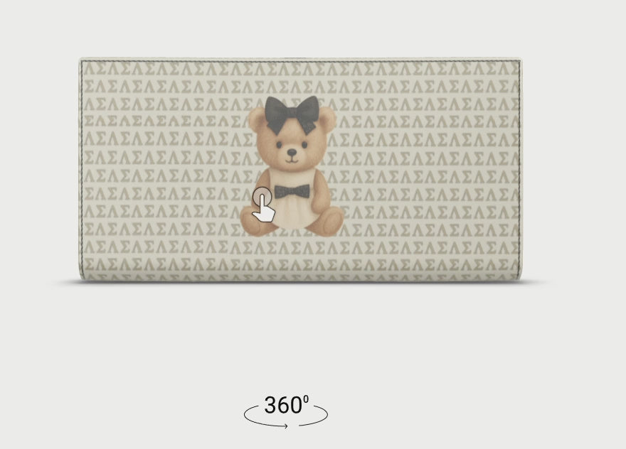 Le Petit Teddy™ Travel Wallet shown from a rotated side angle, highlighting the full-grain Nappa leather exterior and seamless microprint pattern.