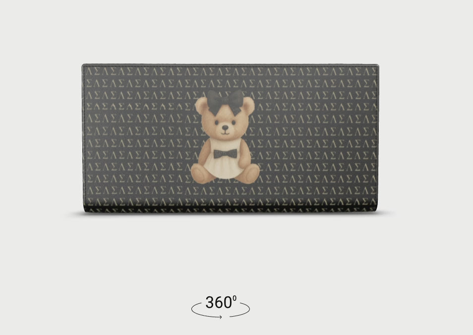 360-degree rotating view of the Le Petit Teddy™ Noir Microprint Wallet, showing the full-grain Nappa leather texture, couture teddy emblem, and repeating Greek-letter monogram from all angles.