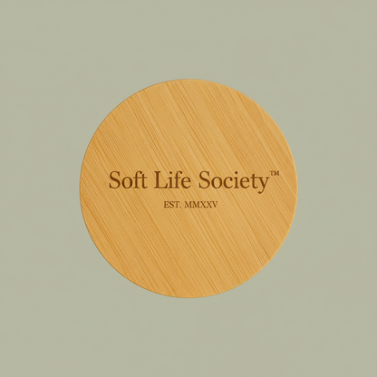 Wooden circular sign with 'Soft Life Society' text on a light green background
